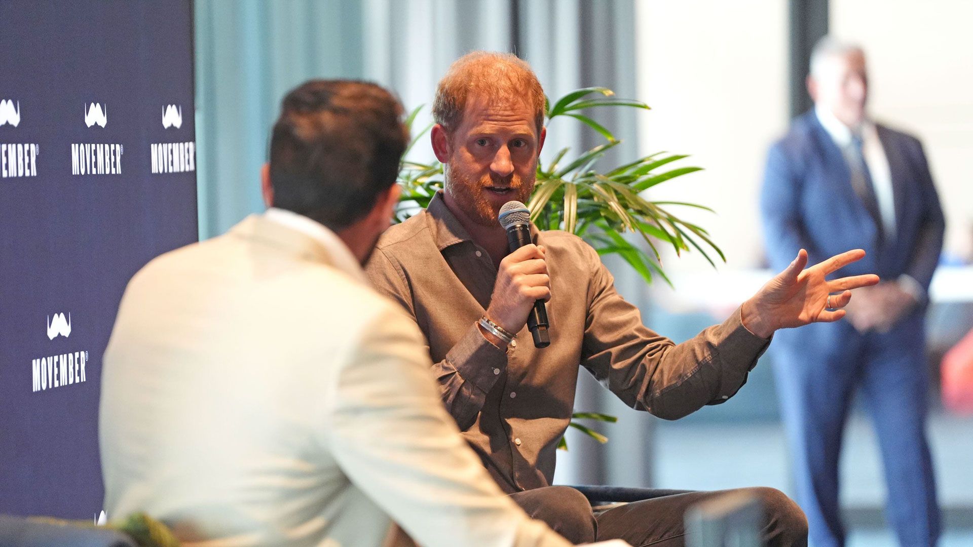 Prince Harry speaking on stage